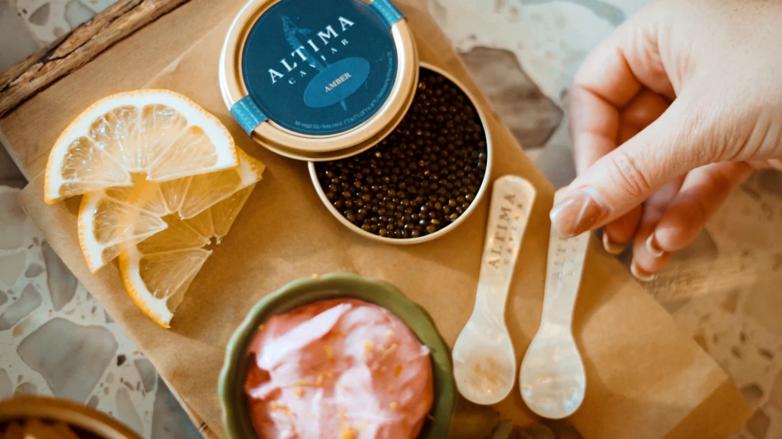 Fiora's procures its sustainable farm-raised caviar varieties from Altima Caviar, with sizes offered from 14g to 100g and five different flavor profiles paired with wonderful, warm little blinis, cornichons and chips.
