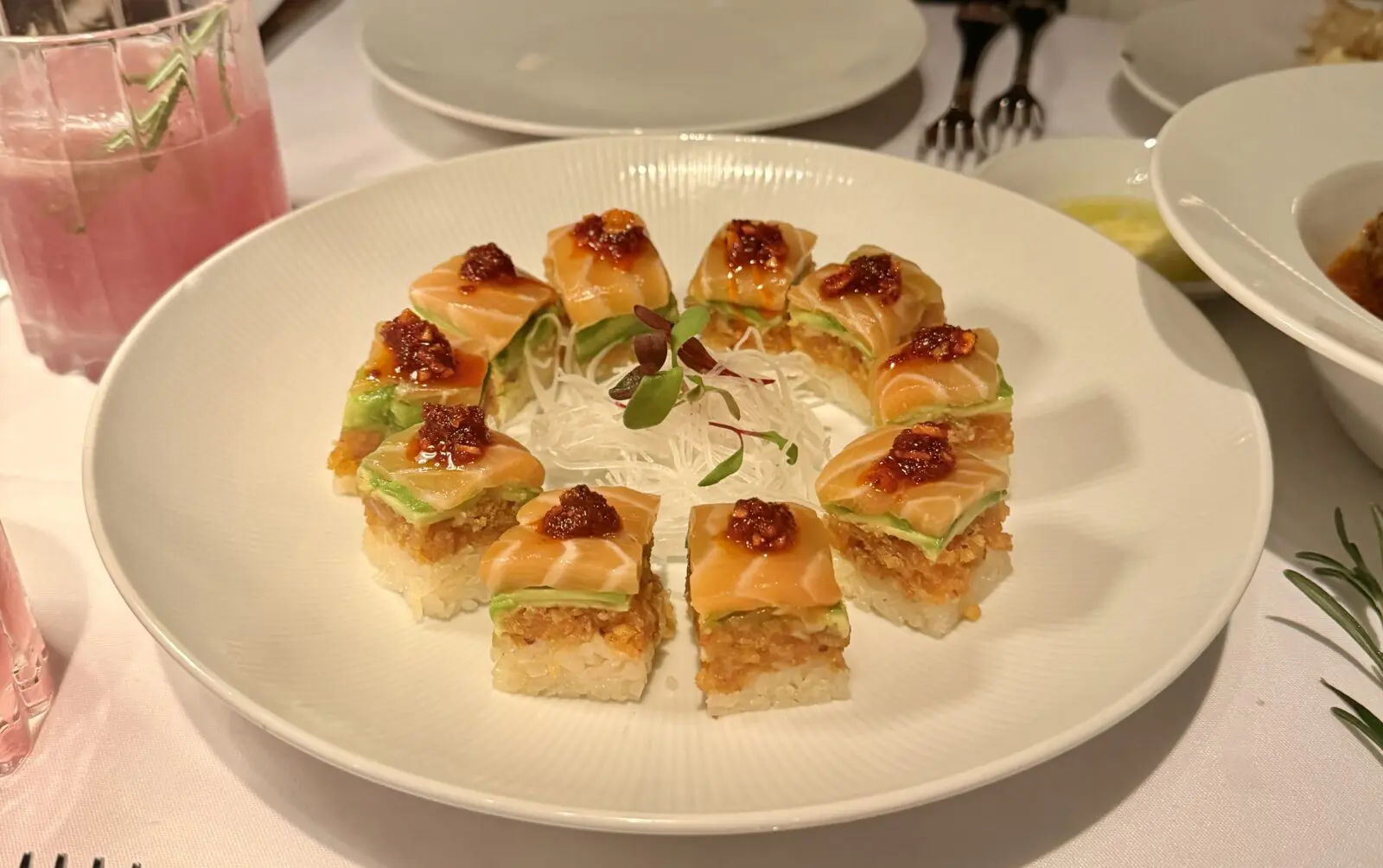 A must-order on Palladino's menu is the salmon belly roll. (Photo by Megan Ziots)