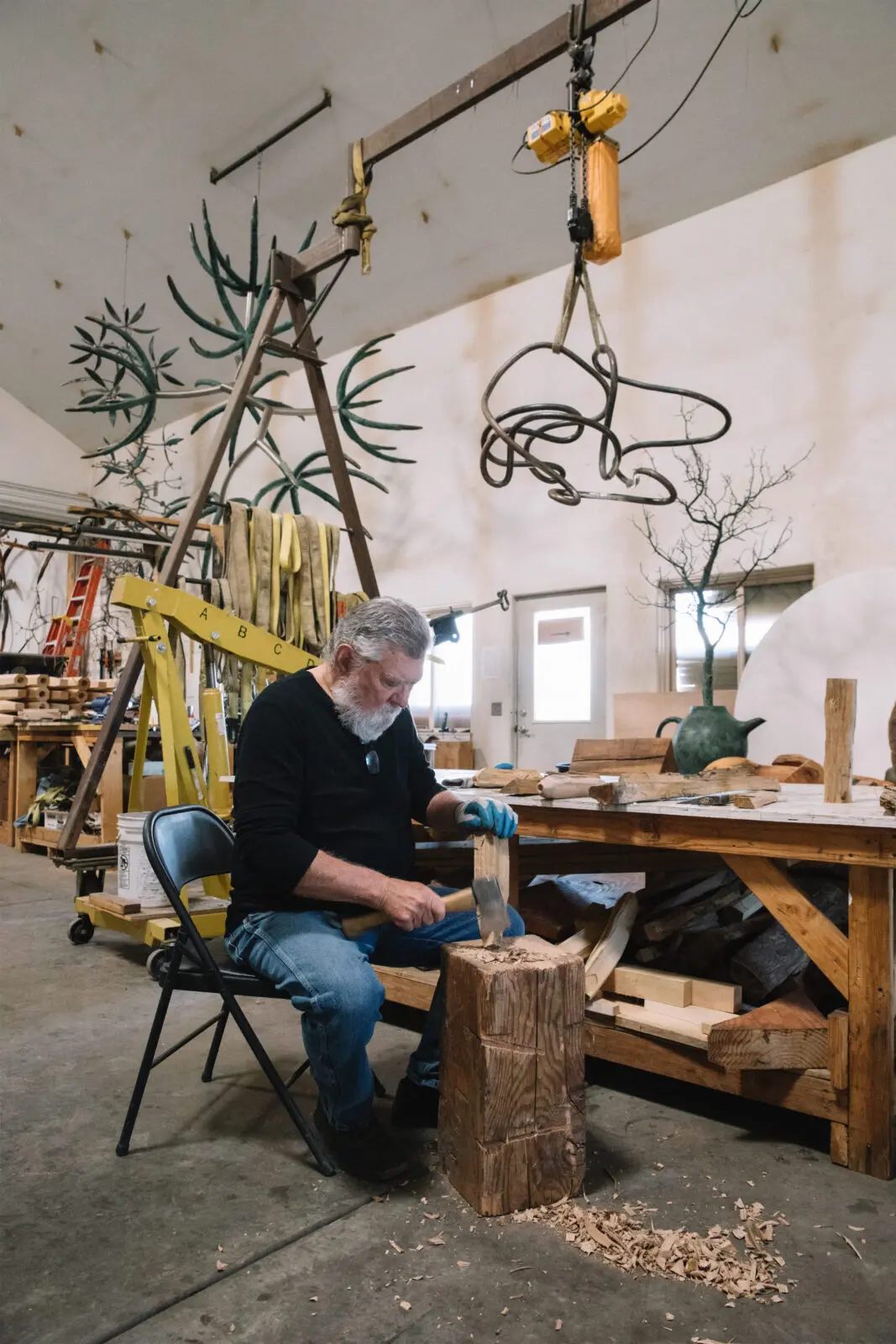 James Surls in his Colorado studio. Curator/art historian/author Susie Kalil says of the artist's upcoming solo at Passage Arts, "Instinctively, I knew in my bones that a James Surls sculpture exhibition had to open this significant endeavor to a larger public." (Photo by Laura Dart)