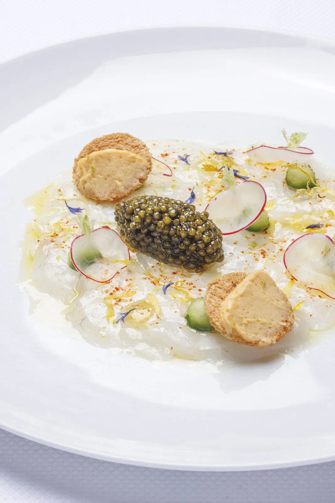 Nuna is the fine dining restaurant aboard Le Commandant Charcot led by award winning chef Alain Ducasse.  (Photo courtesy of PONANT Explorations).