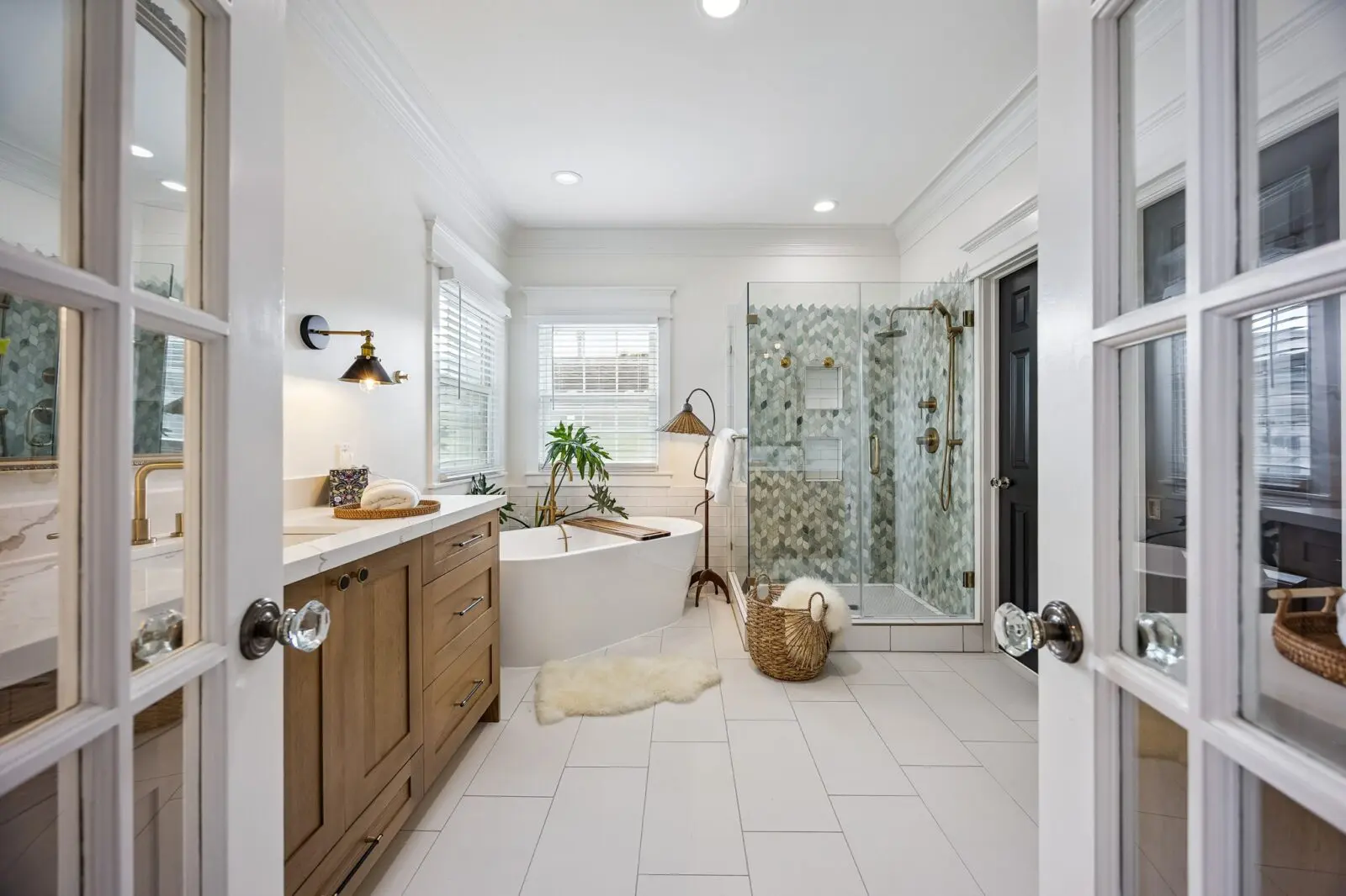 The recently renovated primary bath at 216 E. 26th street (Photo by TK Images for Martha Turner Sotheby's International Realty)