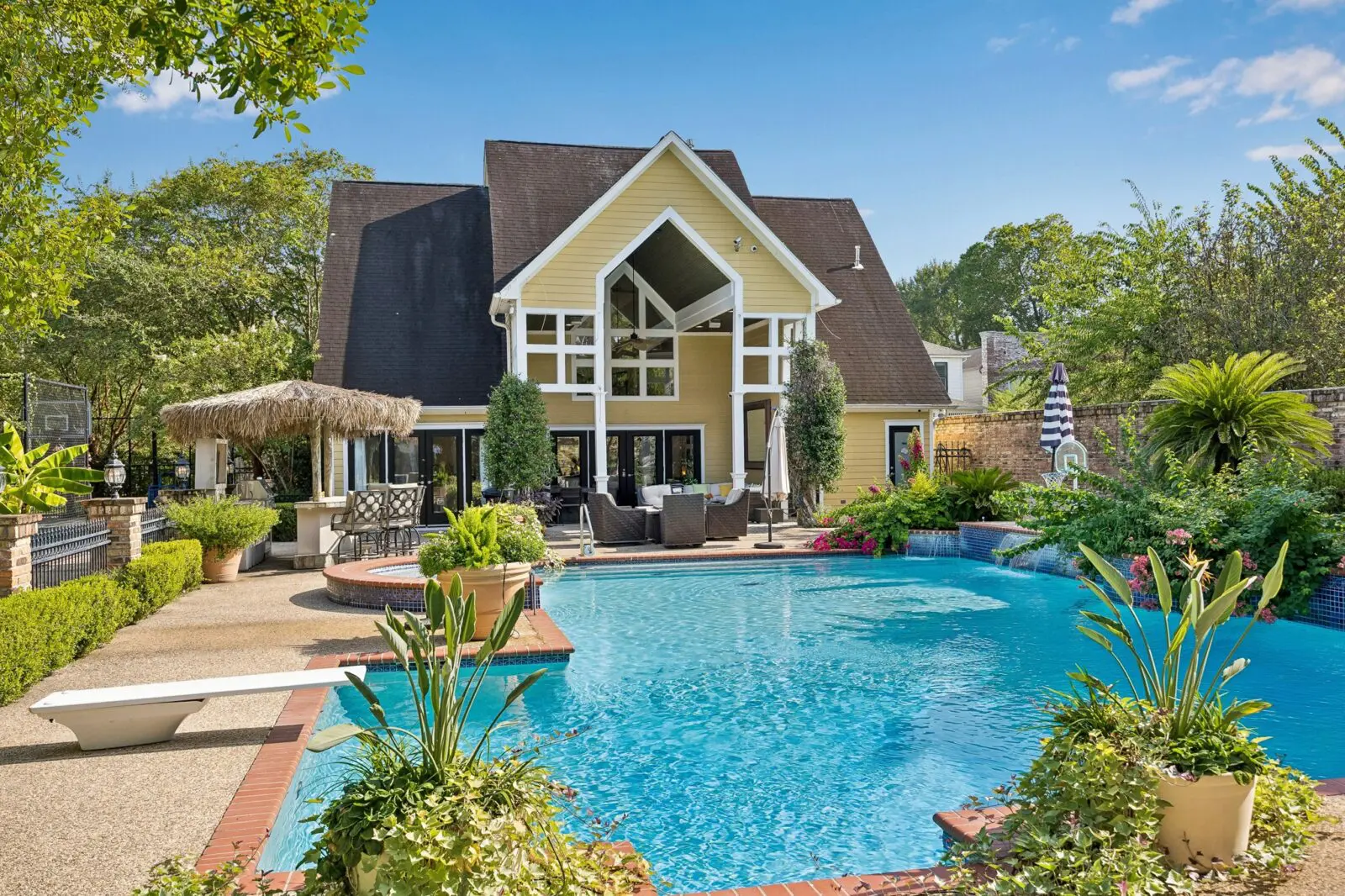 The exceptional pool house at 216 E. 26th Street features an elevator, full kitchen and two bedrooms. (Photo by TK Images for Martha Turner Sotheby's International Realty)