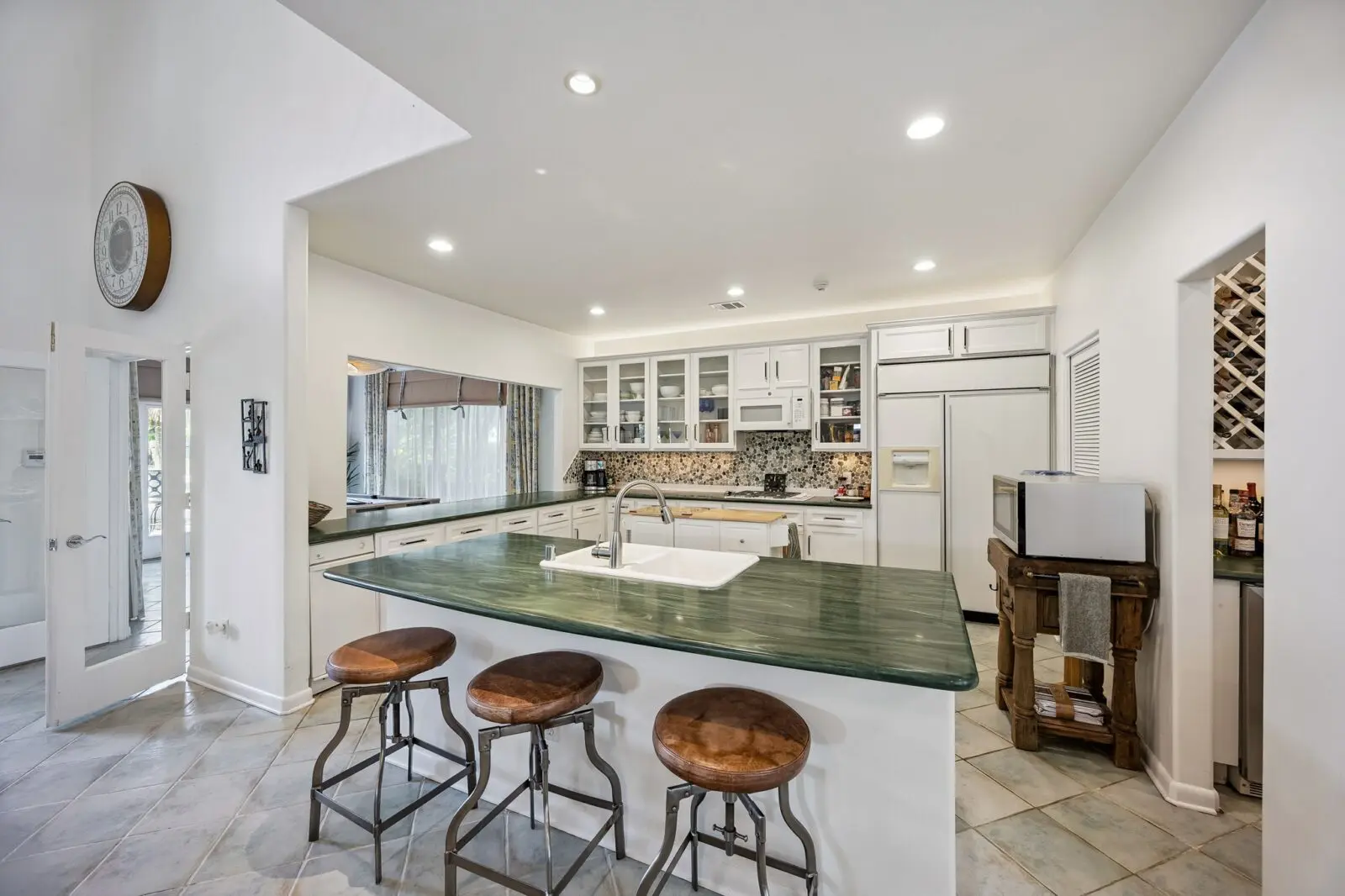 The pool house boasts a full kitchen. (Photo by TK Images for Martha Turner Sotheby's International Realty)