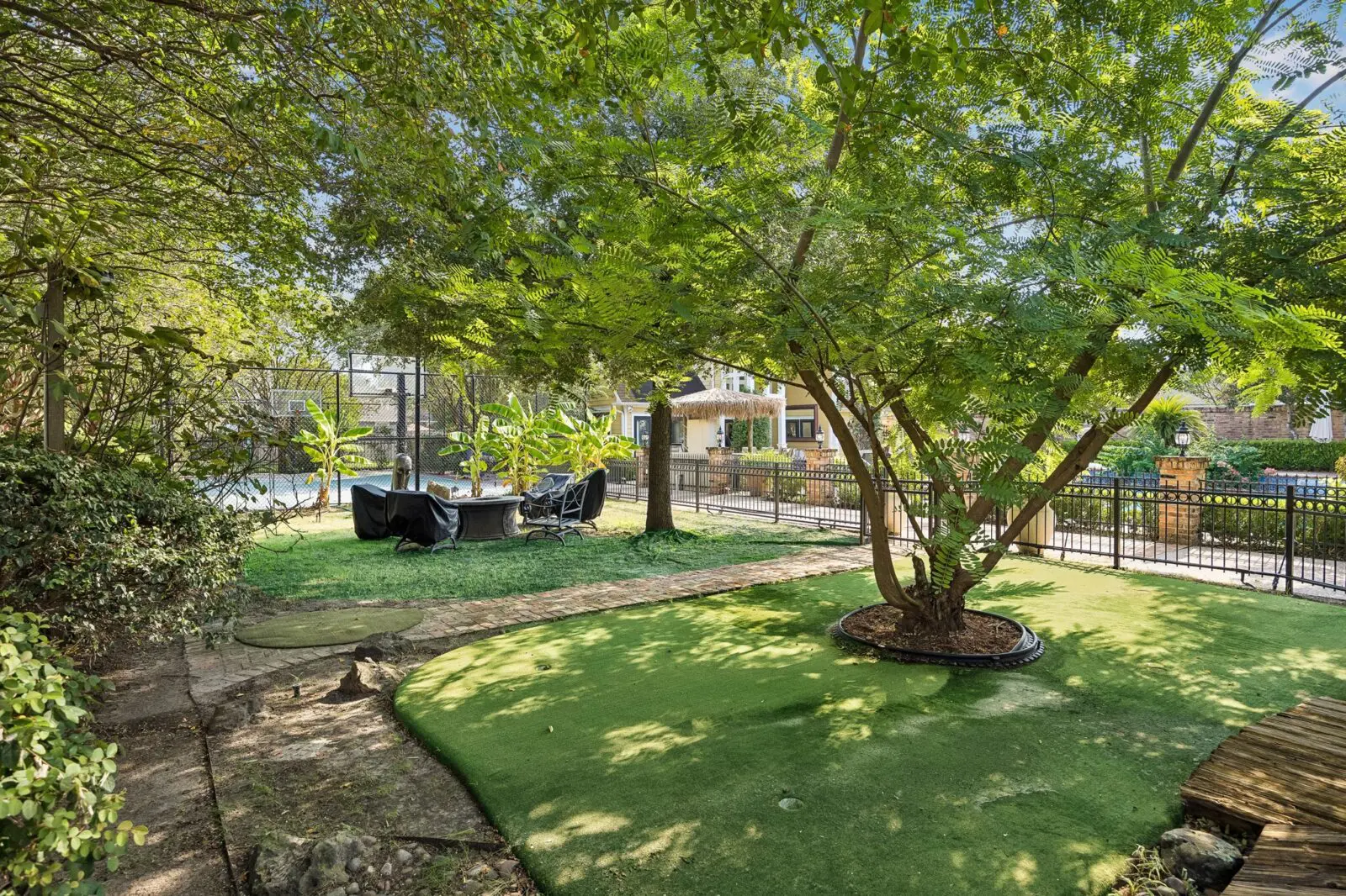 The property at 216 E. 26th Street includes a fire pit and sitting area. (Photo by TK Images for Martha Turner Sotheby's International Realty)