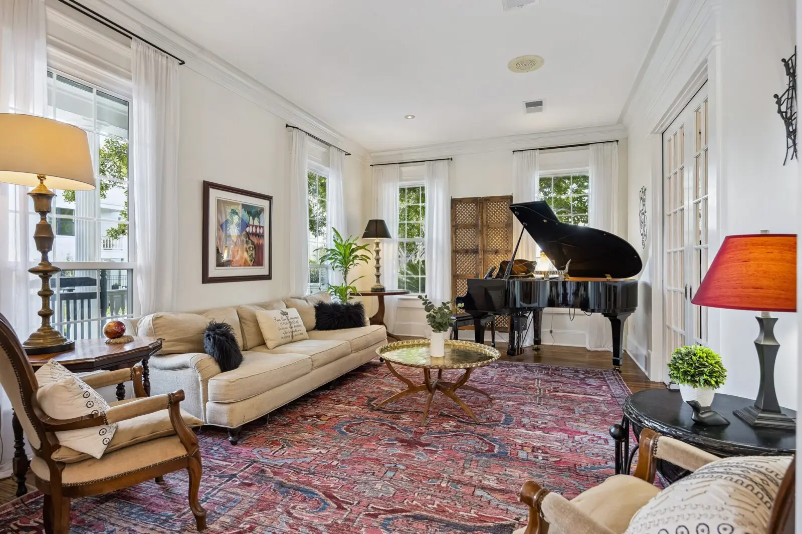 High ceilings and French style glass doors at 216 E. 26th Street speak to the Victorian architectural heritage of the neighborhood. (Photo by TK Images for Martha Turner Sotheby's International Realty)