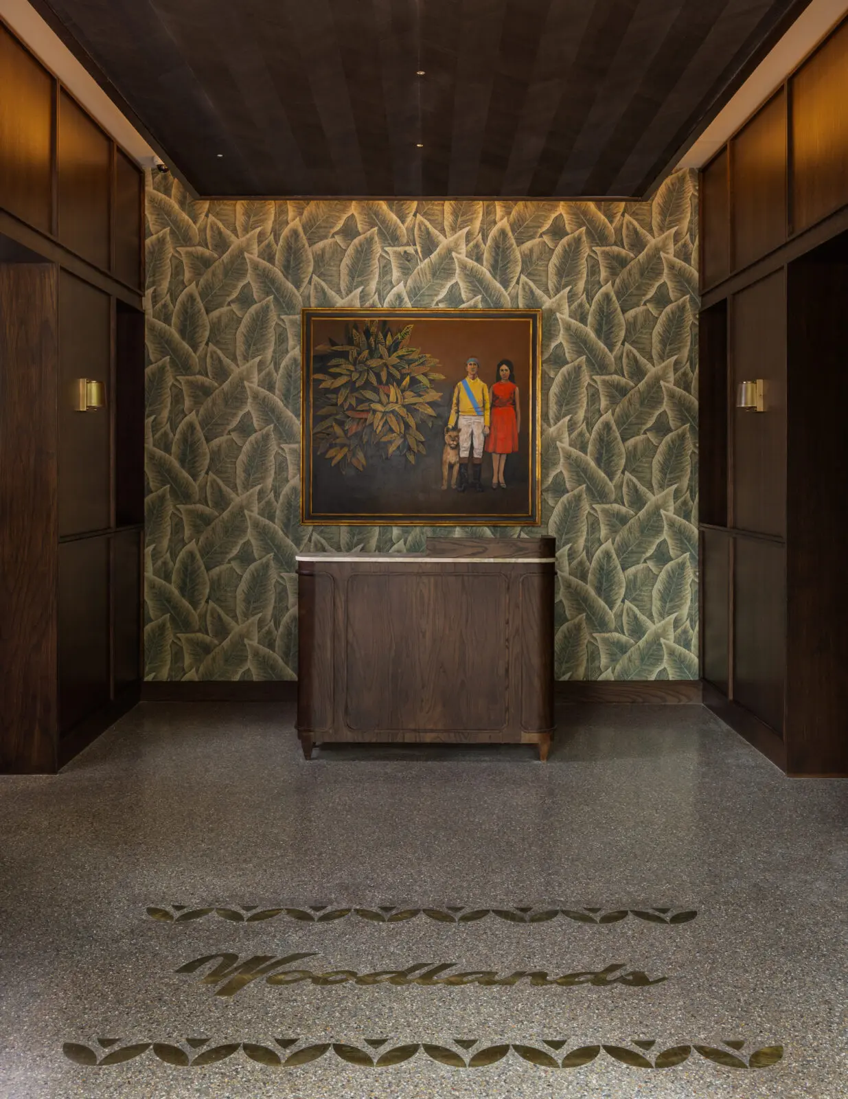 The entryway at Bar Bludorn in The Woodlands has original art, and Woodlands embedded in the flooring. (Photo courtesy of Claudia Casbarian)