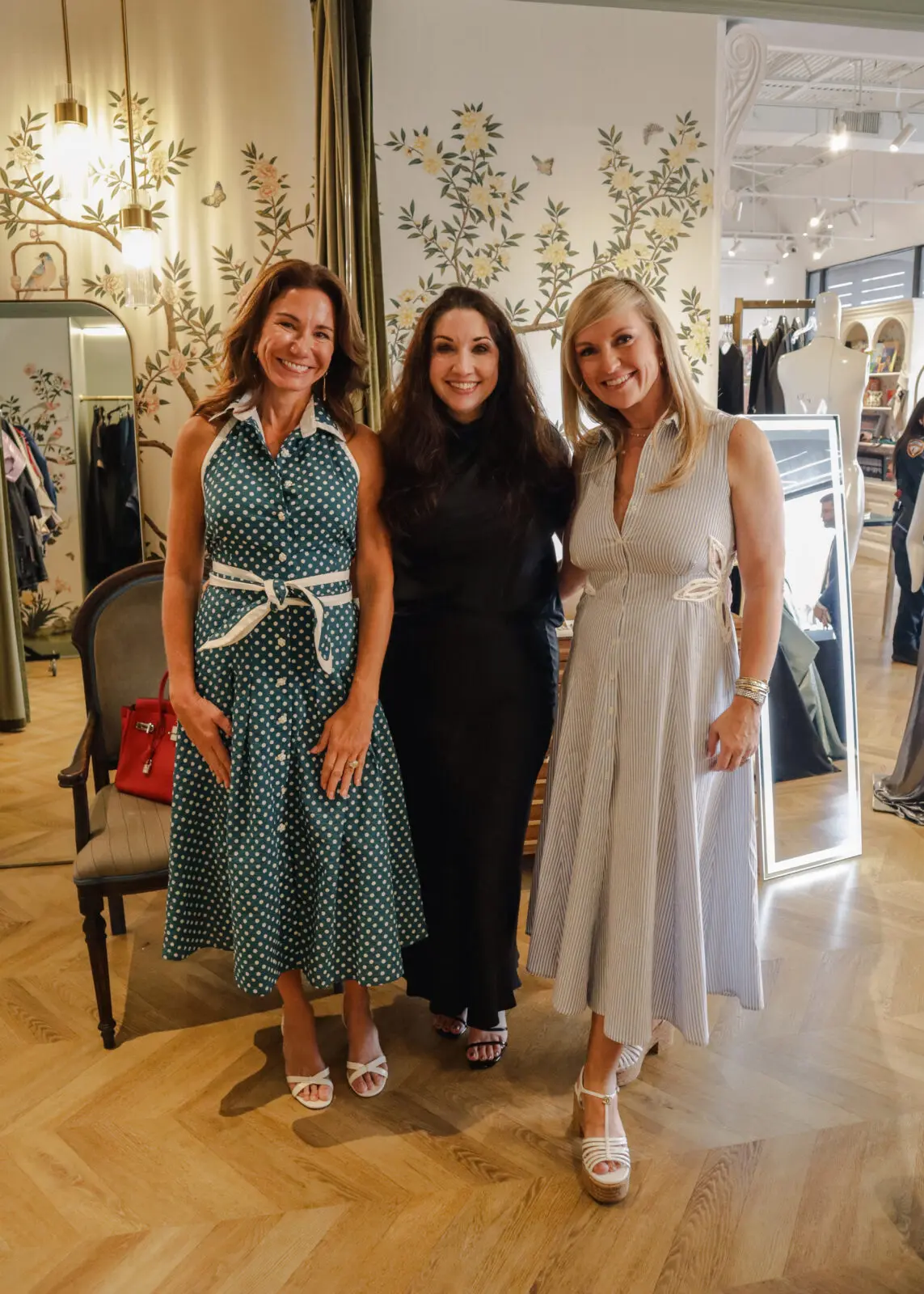 Angie Signorelli, Jill Thompson and Casey Beyer take in the Rubin Singer trunk show.