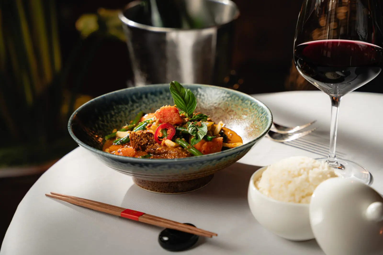 Bò Xào Satế, a beef in a spicy saté sauce, is one of the Le Colonial original dishes that is back on the restaurant's anniversary celebration menu. (Photo by Duc Hoang)