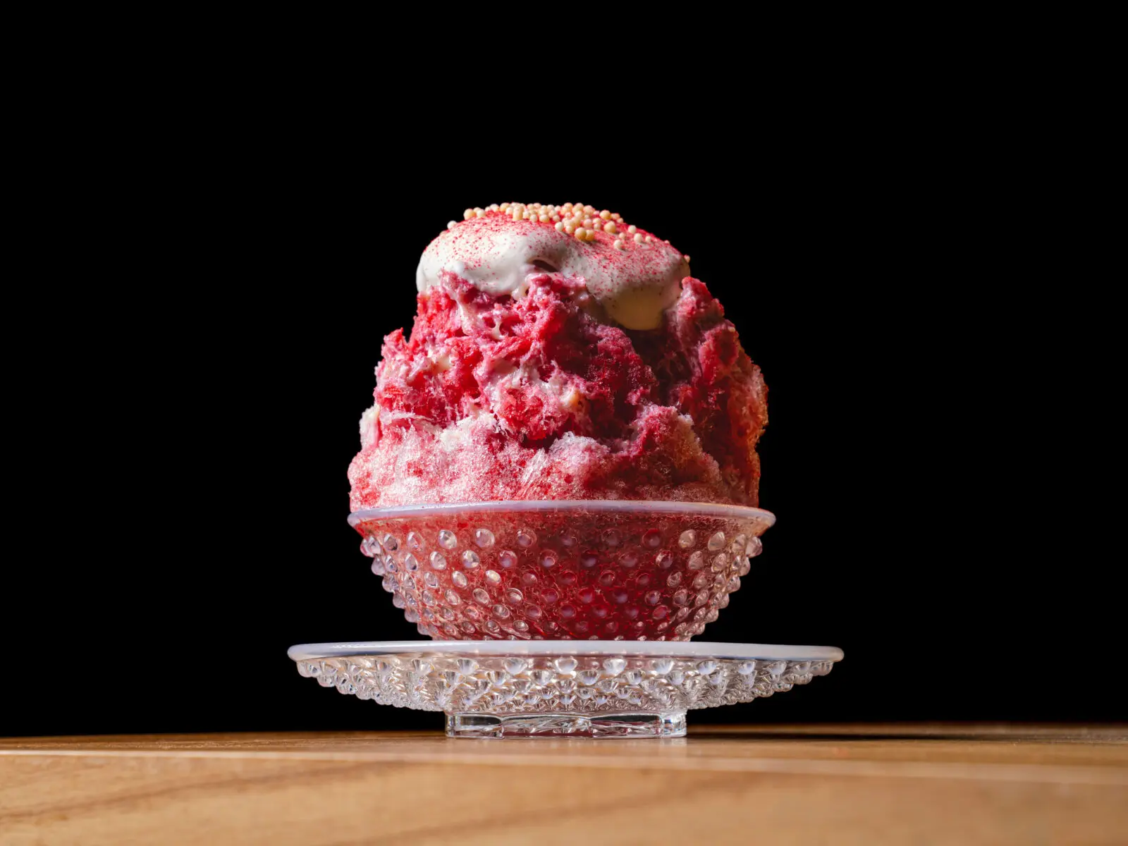 Built layer upon layer, the raspberry kakigori ($15) I tried is made with a combination of fresh raspberry coulis and a concentrated pectin-rich essence, squirted on each layer before it's topped with a drizzle of sweetened condensed milk and a generous dollop of rich, softly whipped cream.