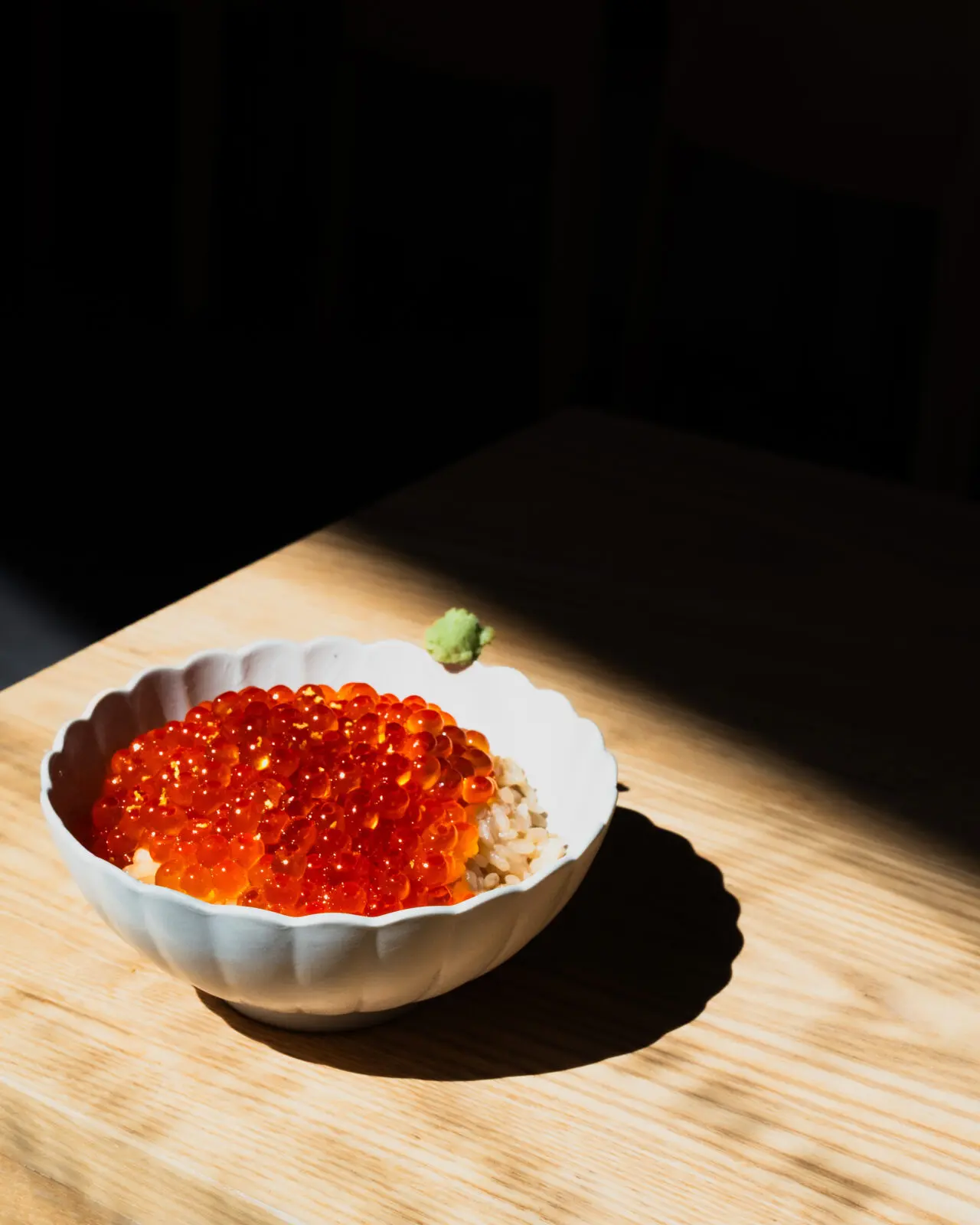 More substantial donburi selections at Kira include five options like this Ikura ($39) topped with a house-marinated Japanese salmon roe.
