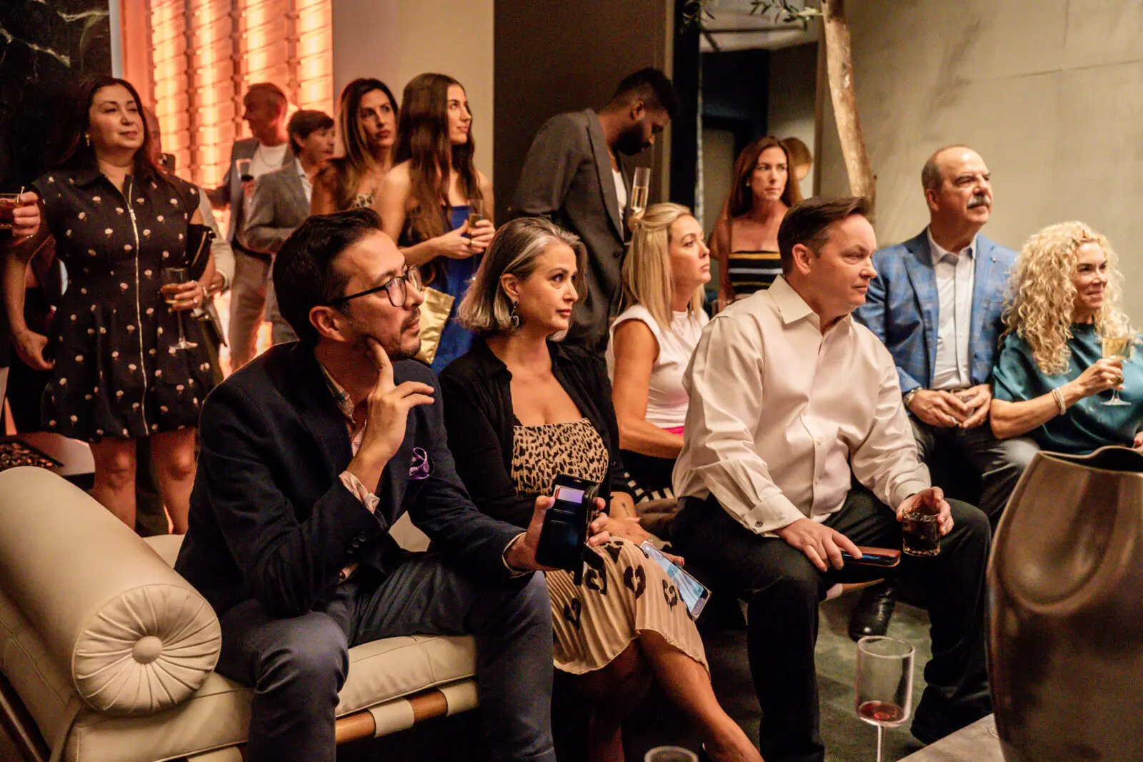 After an hour of cocktails and socializing, guests were called to Chad’s living room for the unveiling of a monumental commission. 
 (Photo by  Meraf Berhanu)