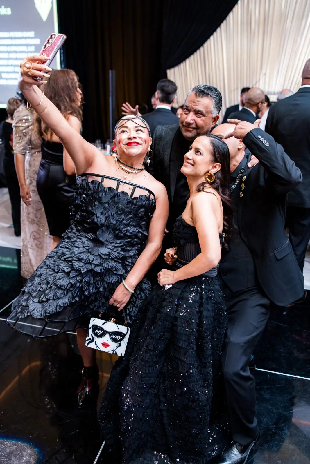 Lisa Valentin and Carolyn Figureoa let loose at the Houston Arts Alliance 20th anniversary gala.