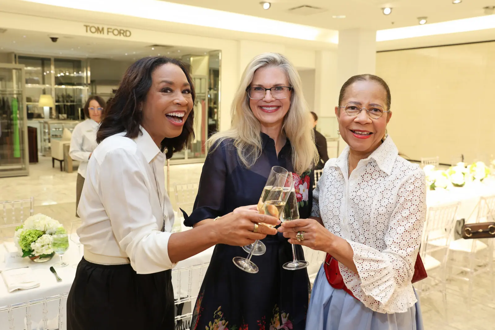 Gina Gaston, Amy Pierce, Merele Yarborough get into the spirit at the Houston Best Dressed Hall of Fame luncheon hosted by Neiman Marcus in the couture salon. (Photo by Priscilla Dickson)