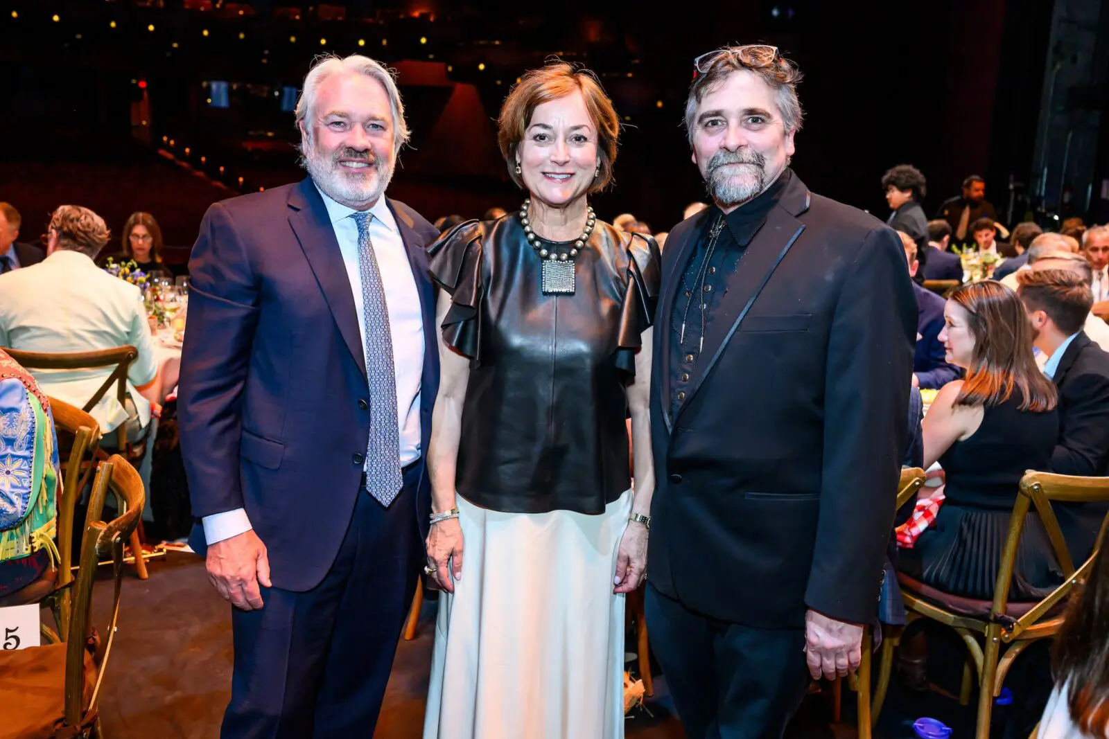 Reggie & Leigh Smith, Stanton Welch at Houston Ballet's opening night dinner on stage at Wortham Theater Center  (Photo by Michelle Watson, CatchlightGroup.com)
