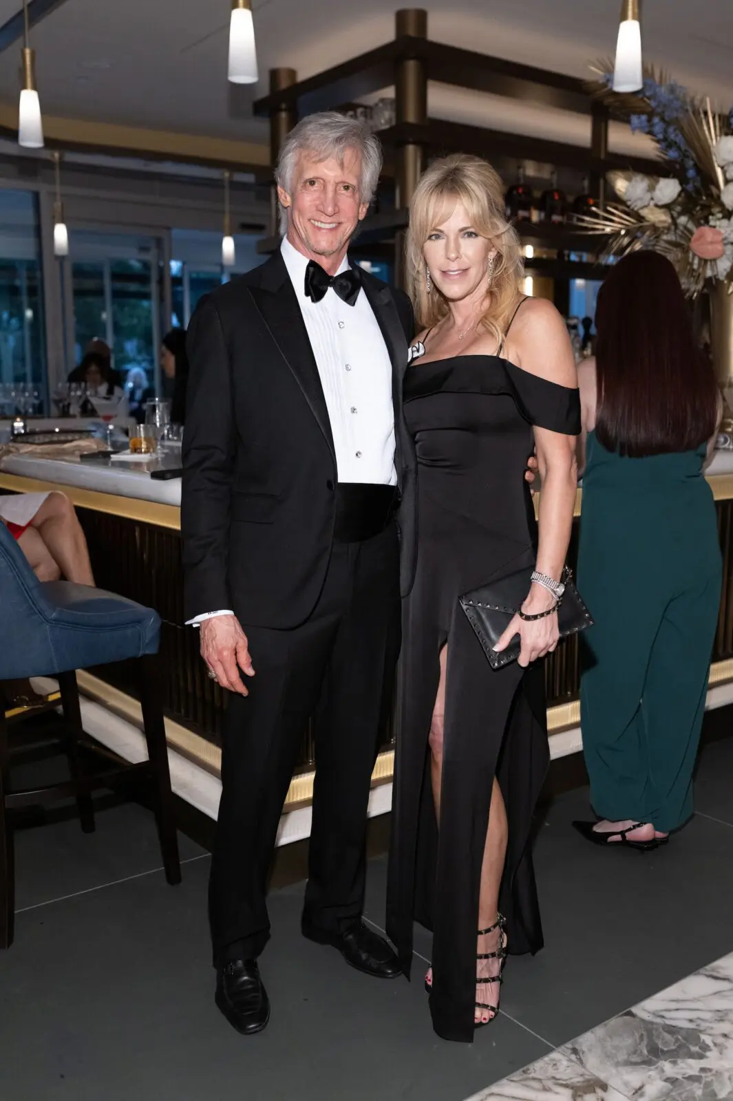 Rocky Stevens, Amy Becker at the VIP grand opening of the deluxe Mack Allen's restaurant.