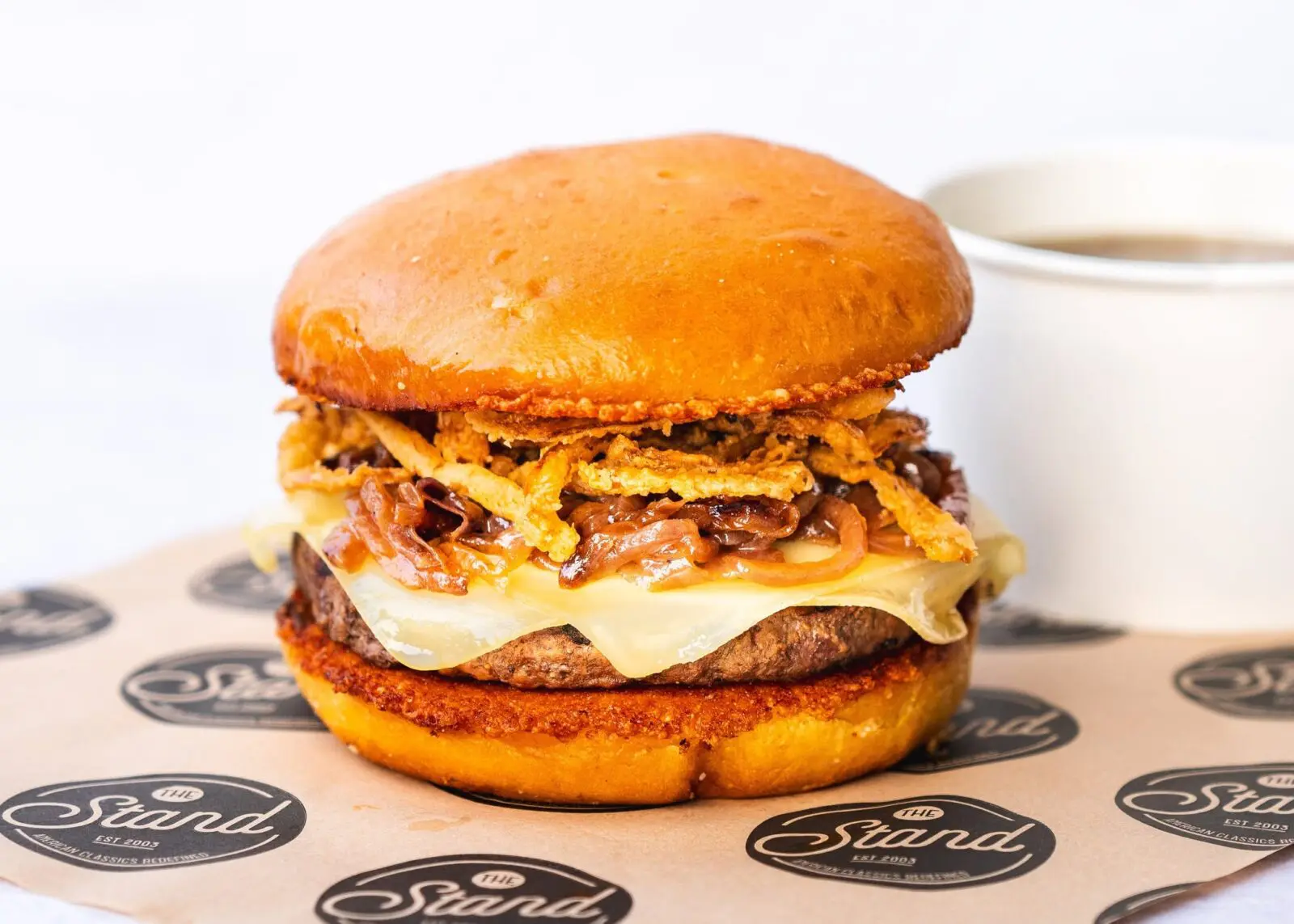 The Stand knows that fried onions can boost the flavor of any cheeseburger. (Photo courtesy of The Stand)