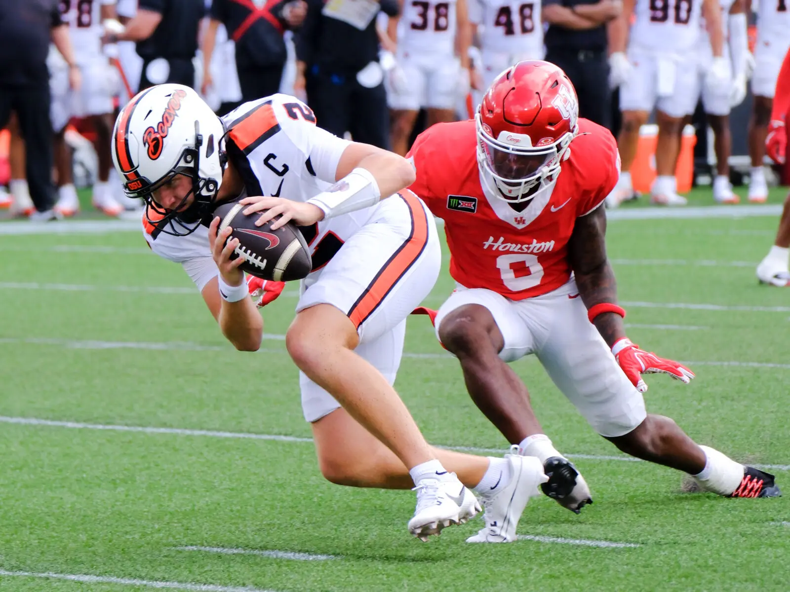 University of Houston defensive back Javion White made Oregon State quarterback Braden Atkinson feel him. (Photo by F. Carter Smith)