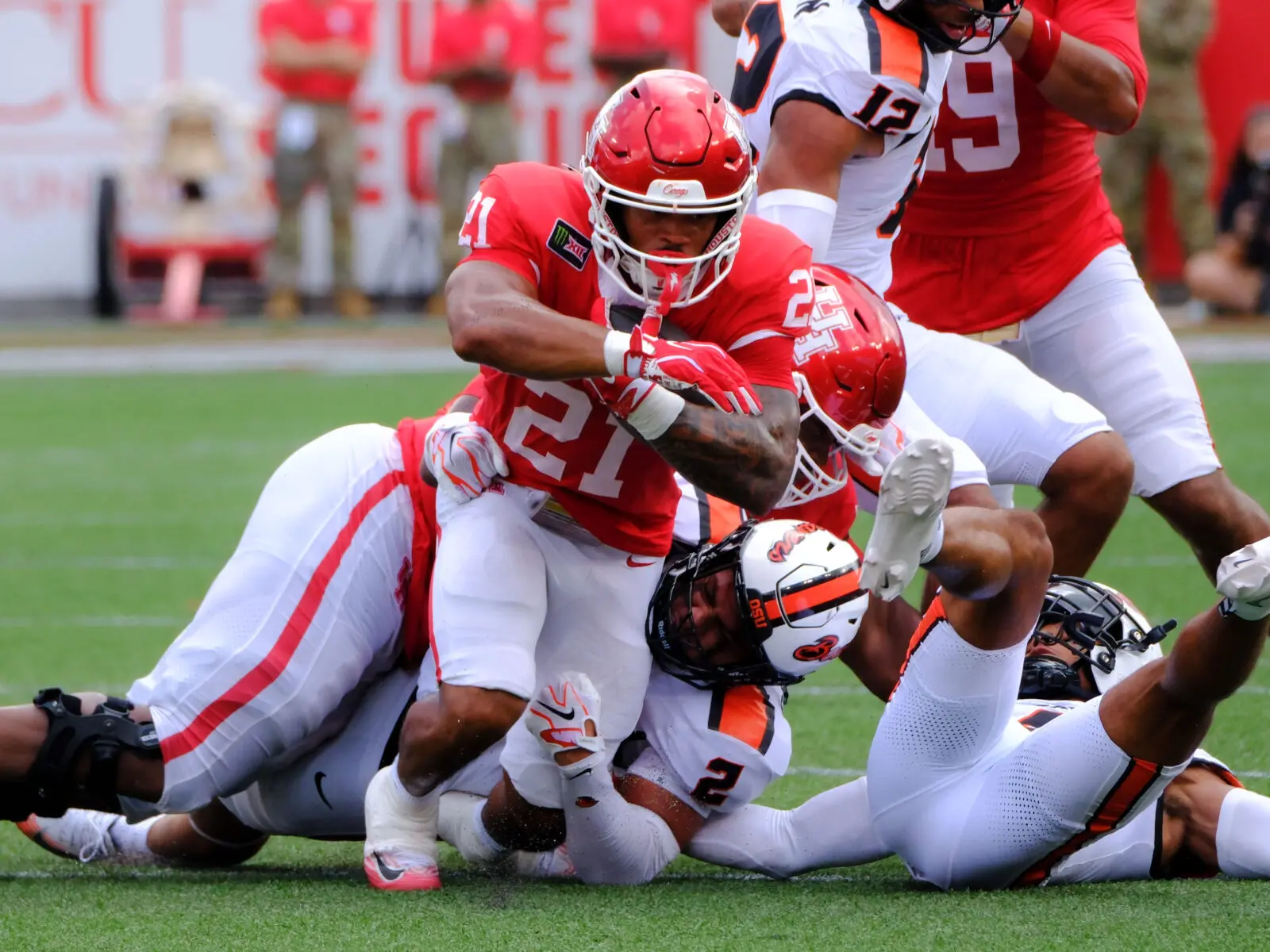 University of Houston running back Makhi Hughes makes breaking tackles seem routine. (Photo by F. Carter Smith)