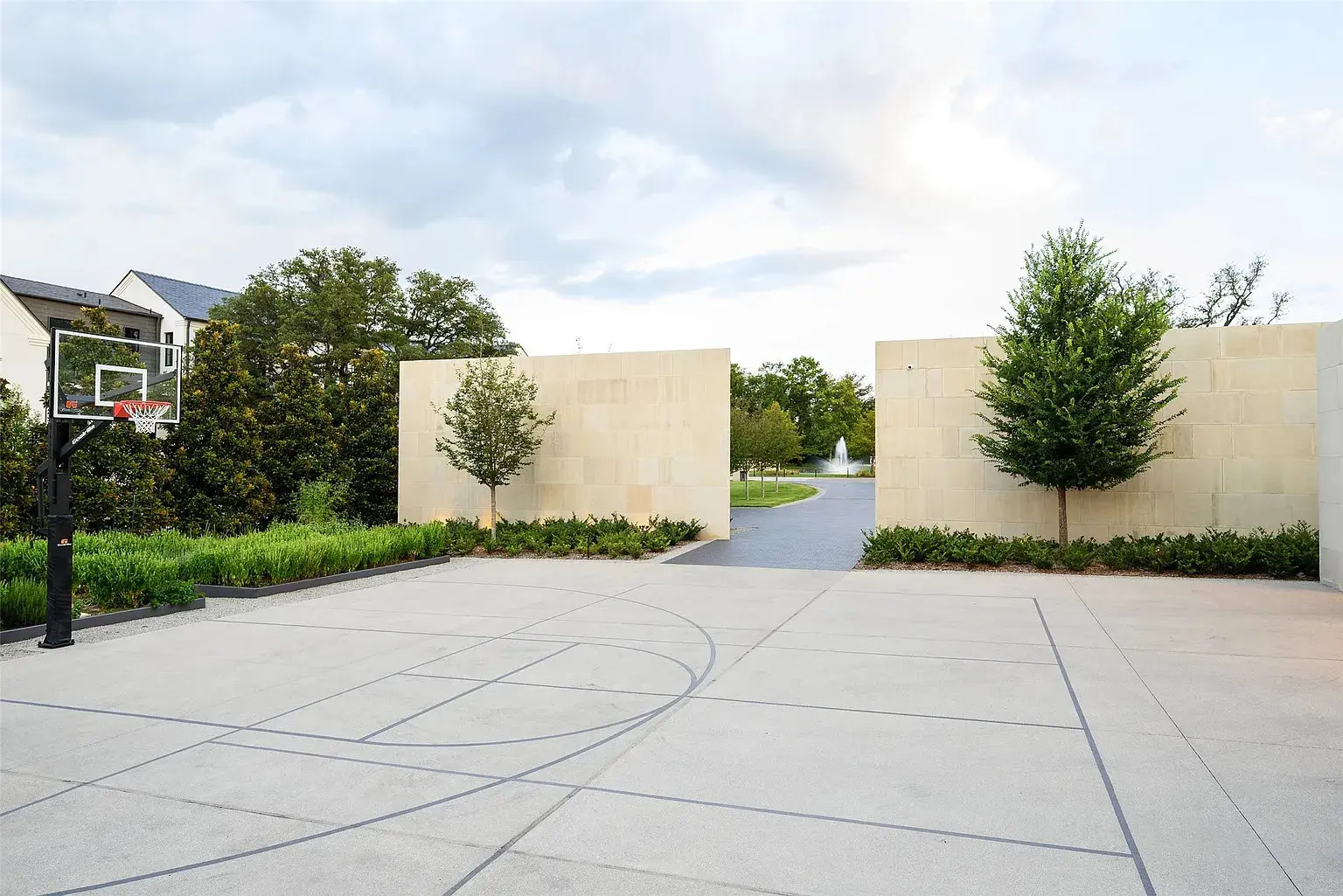 The home includes volleyball and sport courts. (Photo by Stephen Reed Photography)