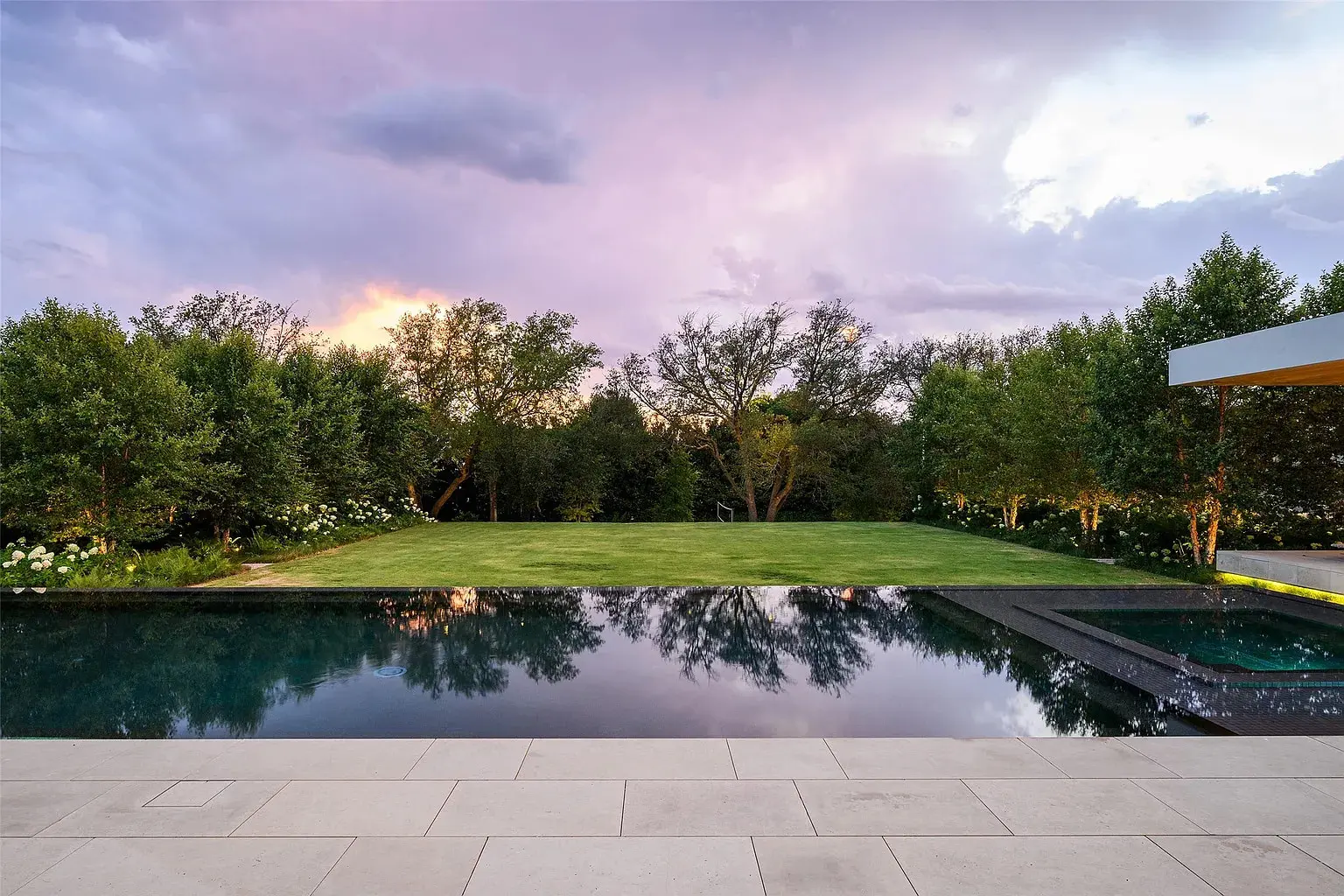 The two-acre property features verdant grounds. (Photo by Stephen Reed Photography)
