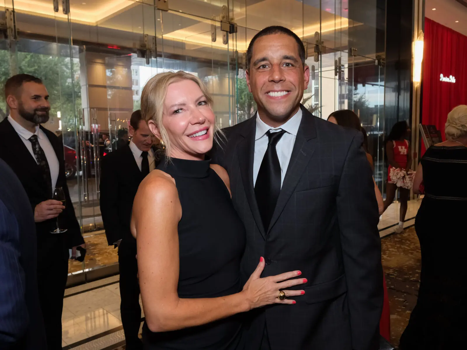 University of Houston assistant coach Kellen Sampson and his wife Tonya, a former coach herself, enjoyed the Hall of Honor night. (Photo by F. Carter Smith)