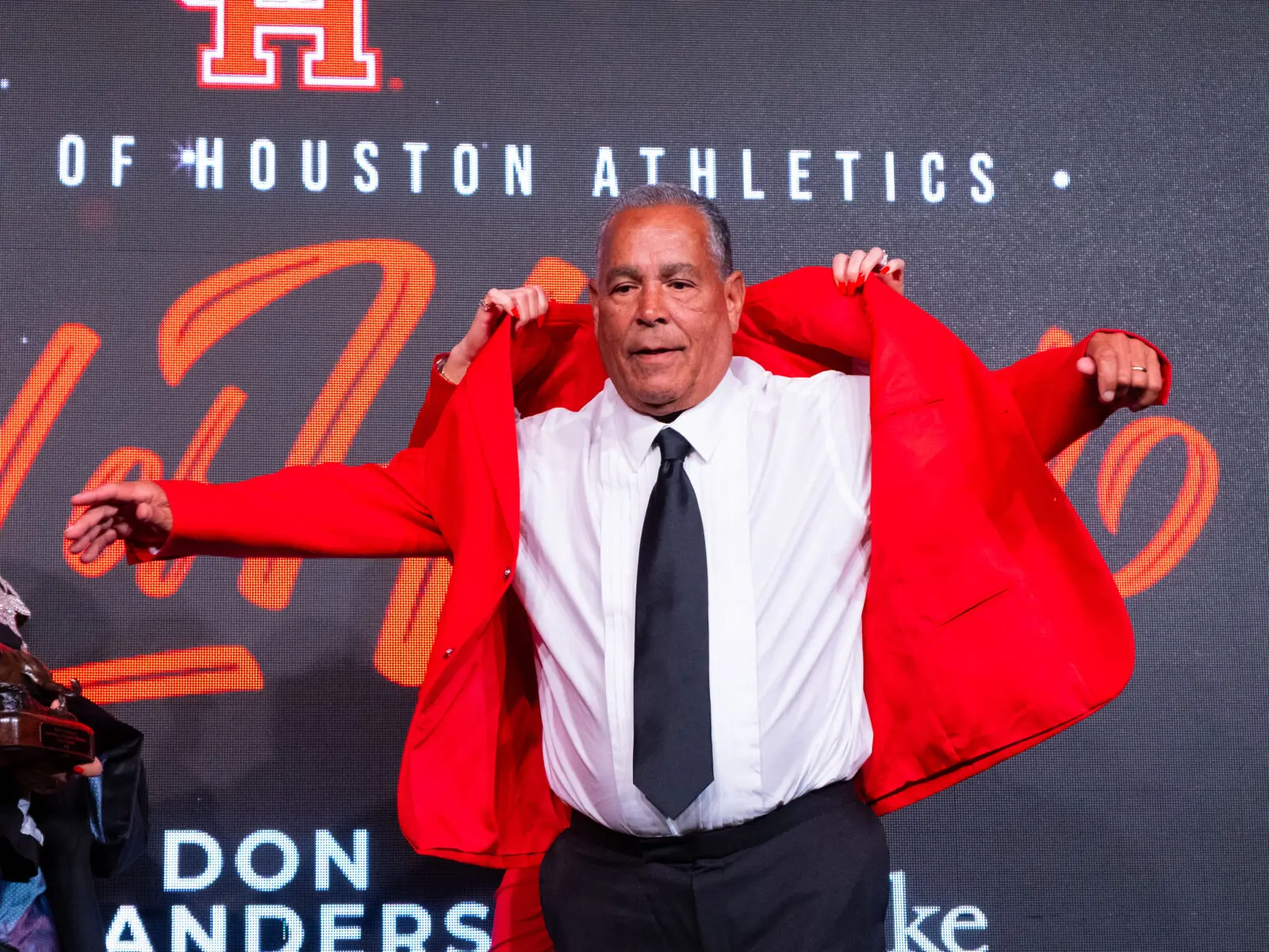 University of Houston coach Kelvin Sampson gets his well deserved UH Hall of Honor red jacket. (Photo by F. Carter Smith)