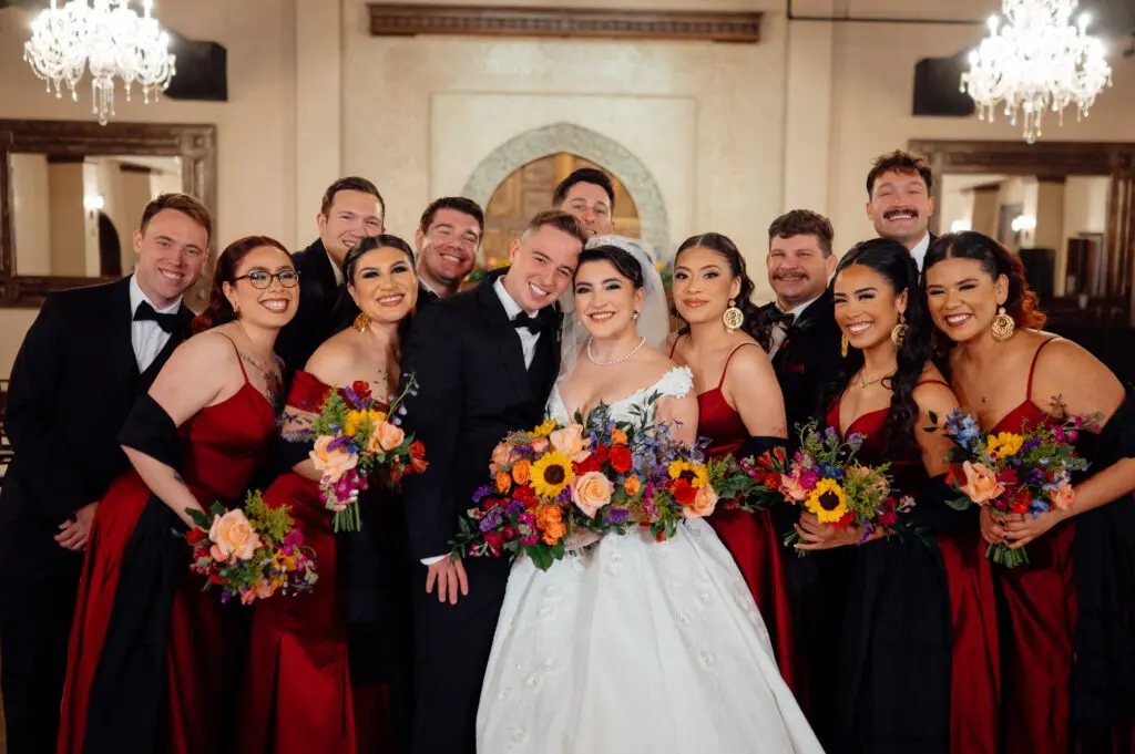 Gracie and Ethan with their attendants at Madera Estates. (Photo by JMG Photography Houston)