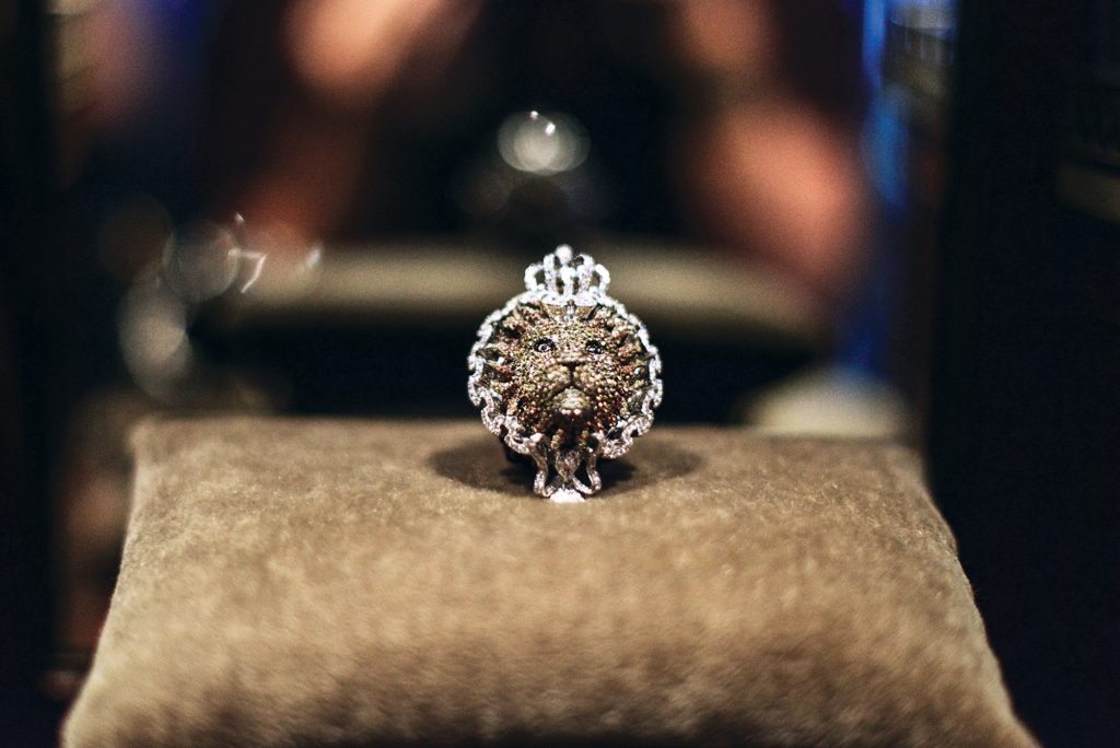 Lion ring by Lydia Courteille in 18K gold with black and
white diamonds, yellow sapphires and citrines, $77,000.