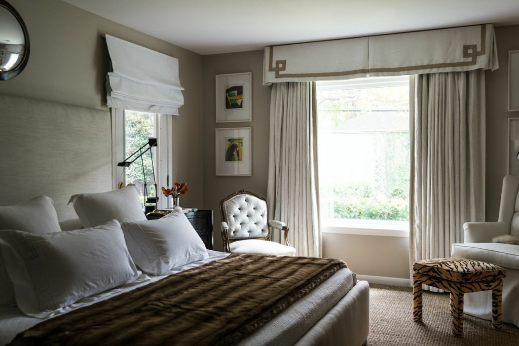 Master Bedroom: wallcolor- Sherwin Williams Accessible Beige, custom upholstered bed through Ashley Goforth, antique gold gilt chair, Tizio Lamp and linens by Sferra Bros.