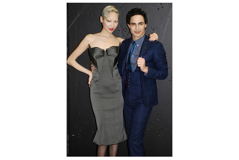 Zac and model backstage at New York Fashion Week,
Fall 2014.