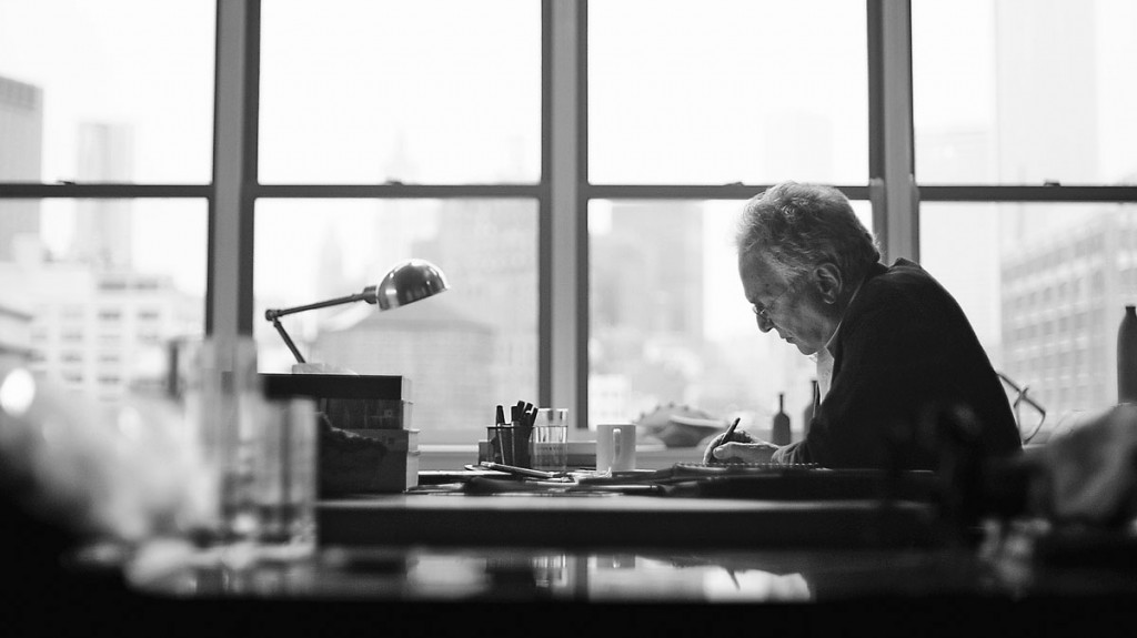 David Yurman sketching at desk.