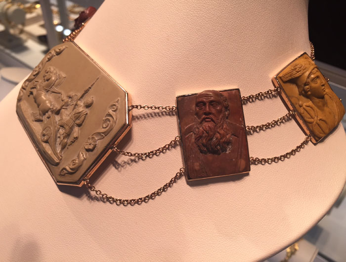 Carved lava-rock necklace from the 1800s, depicting Greek gods. At Past Era Fine Antique Jewelry (Houston). 
