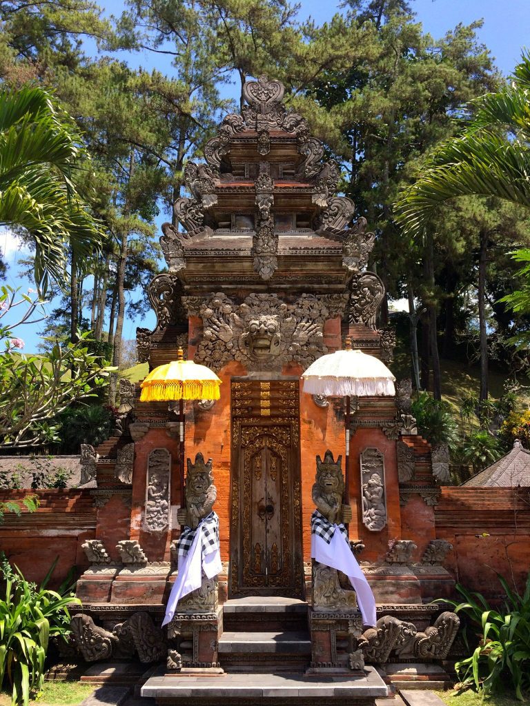 Hand carved entrance to one of the Hindu temples on a holy day.