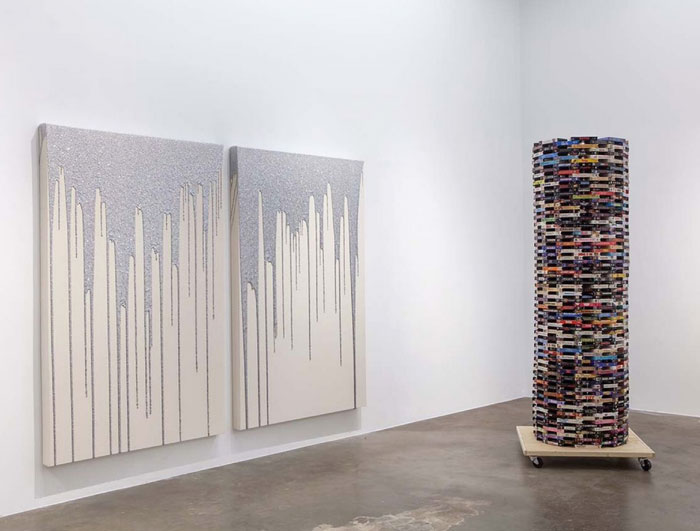 Chivas Clem's 2015 canvases, "Painting for Genevieve Bujold" and "Painting for Giorgio Moroder," cozy up to the aptly named sculpture, "Totem I (comedy, action, drama, thriller, horror)," 2013-2015.