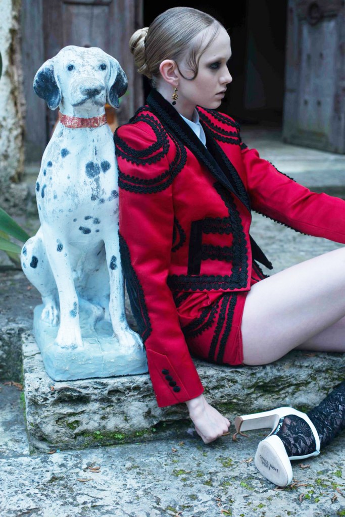 Dolce & Gabbana silk embroidered cropped jacket, cotton dress shirt, silk embroidered culotte, gold chain pendant necklace, earrings, patent-leather T-strap pump with black lace stockings, Nancey Chapman diamond and black spinel ring 