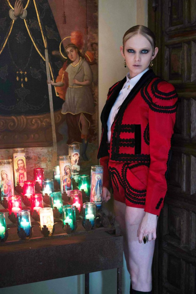 Dolce & Gabbana silk embroidered cropped jacket, cotton dress shirt, silk embroidered culotte, gold chain pendant necklace, earrings, patent-leather T-strap pumps with black lace stockings, Nancey Chapman diamond and black Spinel ring 