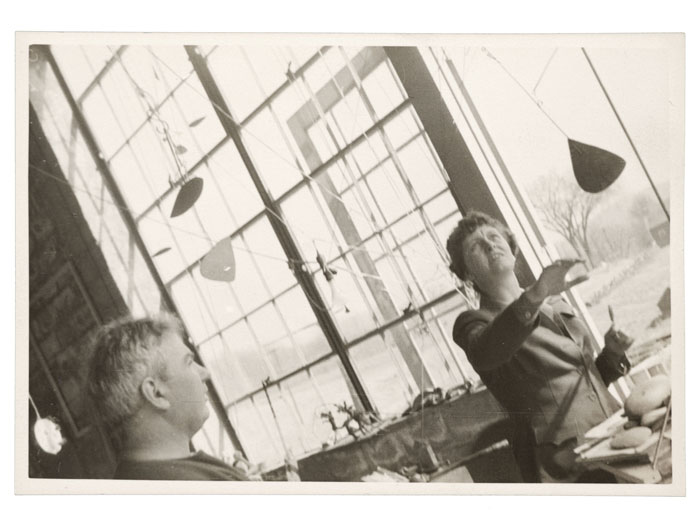 Master of the mobile Alexander Calder with Vassar professor of art Agnes Rindge Claflin in Calder’s studio, circa 1942. Agnes Rindge Claflin papers concerning Alexander Calder.