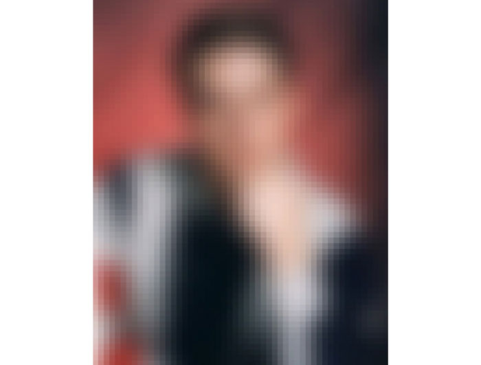 Amy Elkins' "13/32 (Not the Man I Once Was)" pixilates a prisoner's image based upon his years spent to date on death row.