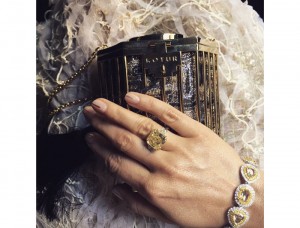 Nasiba Adilova's accessories for the evening, including a Kotur clutch