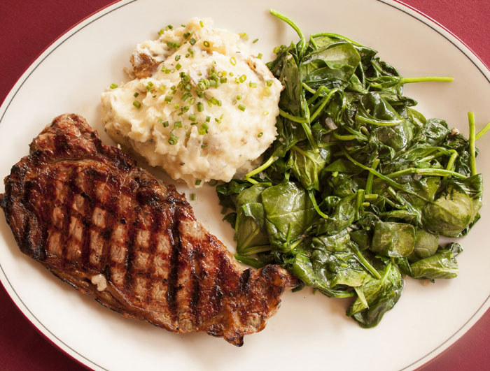 16 oz. Hereford 1881 NY Strip Steak with spinach & mashed potatoes at Laurenzo's