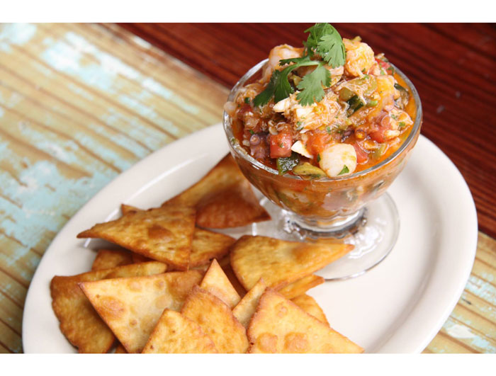 Smoke Tomato Campechana: Mexican seafood cocktail with crab, octopus, scallops and gulf shrimp served with tortilla chips