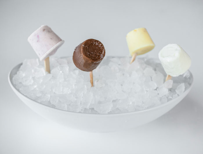 Coconut, Strawberry Cream, Chocolate and Sweet Corn bite size Paletas at Peska Seafood Culture. 