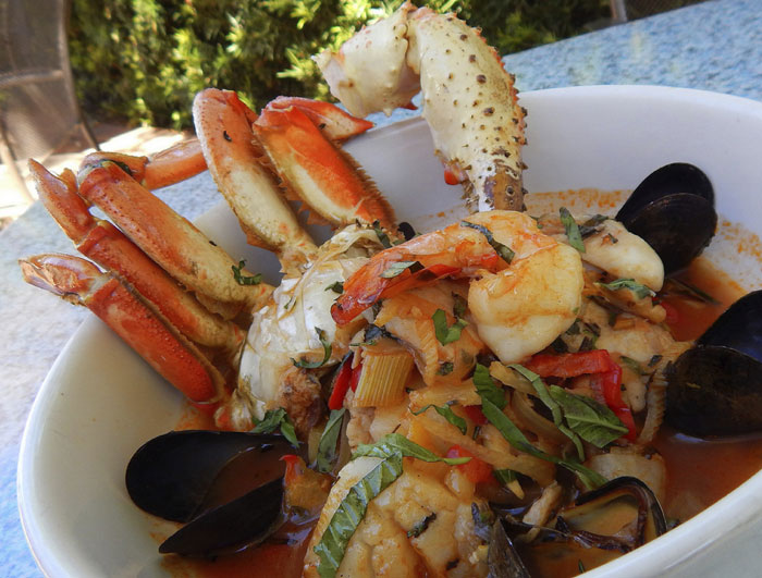 Cioppino at Tony Mandola's. Dungeness crab, mussels, shrimp, fish, scallops, peppers, and potatoes
in a rich broth. 