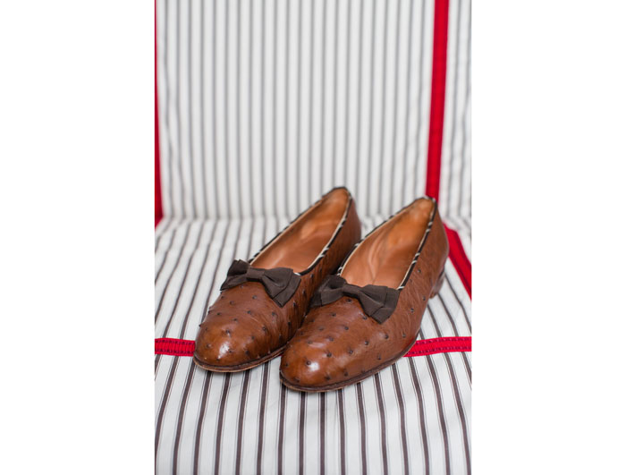 A pair of custom made ostrich slip ons 