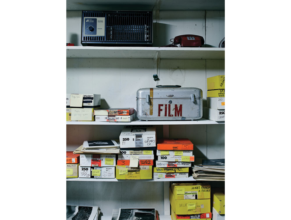 Shelves in the print viewing
room contain prints of past
photography projects.