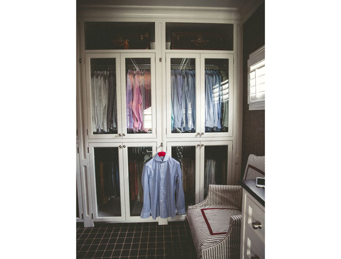 Gingham and plain white button downs are two of Powers' go-tos