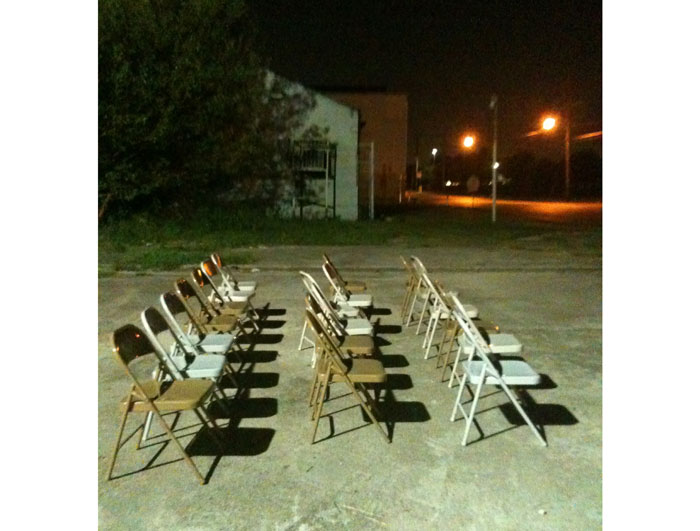 A lineup of chairs at night's end marked the temporary site of this surreal cinematic experience. Photo Catherine D. Anspon. 
