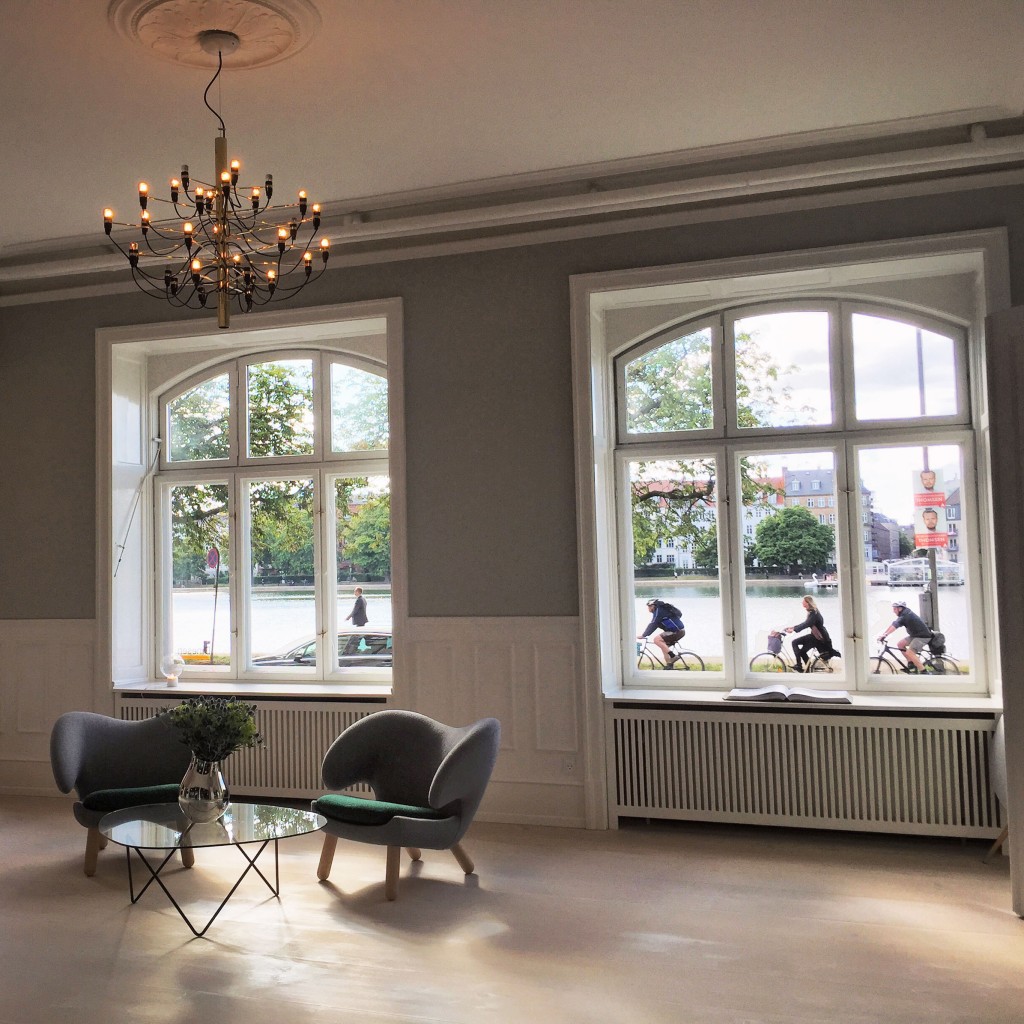 Cyclists commuting outside the Dinesen Showroom | Copenhagen