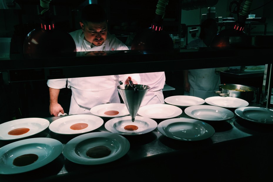 Justin Santellana at work in the kitchen.