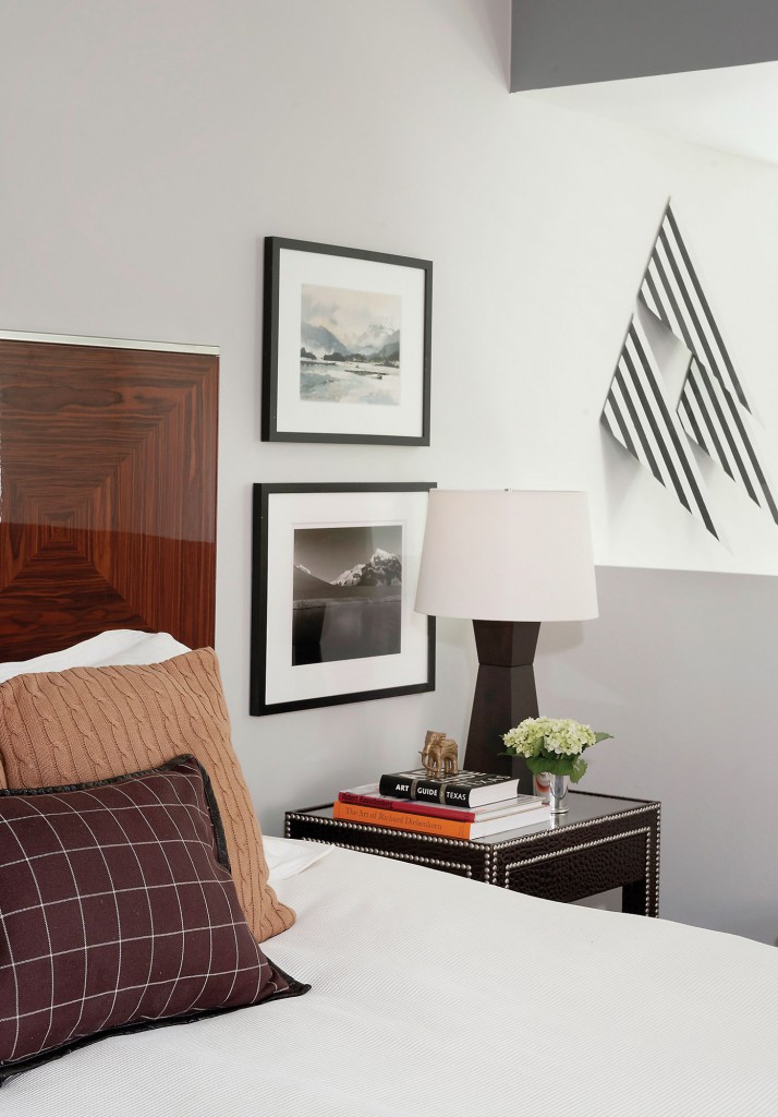 The master bedroom’s right wall opens up into the living room.